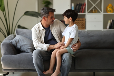 father talking to son